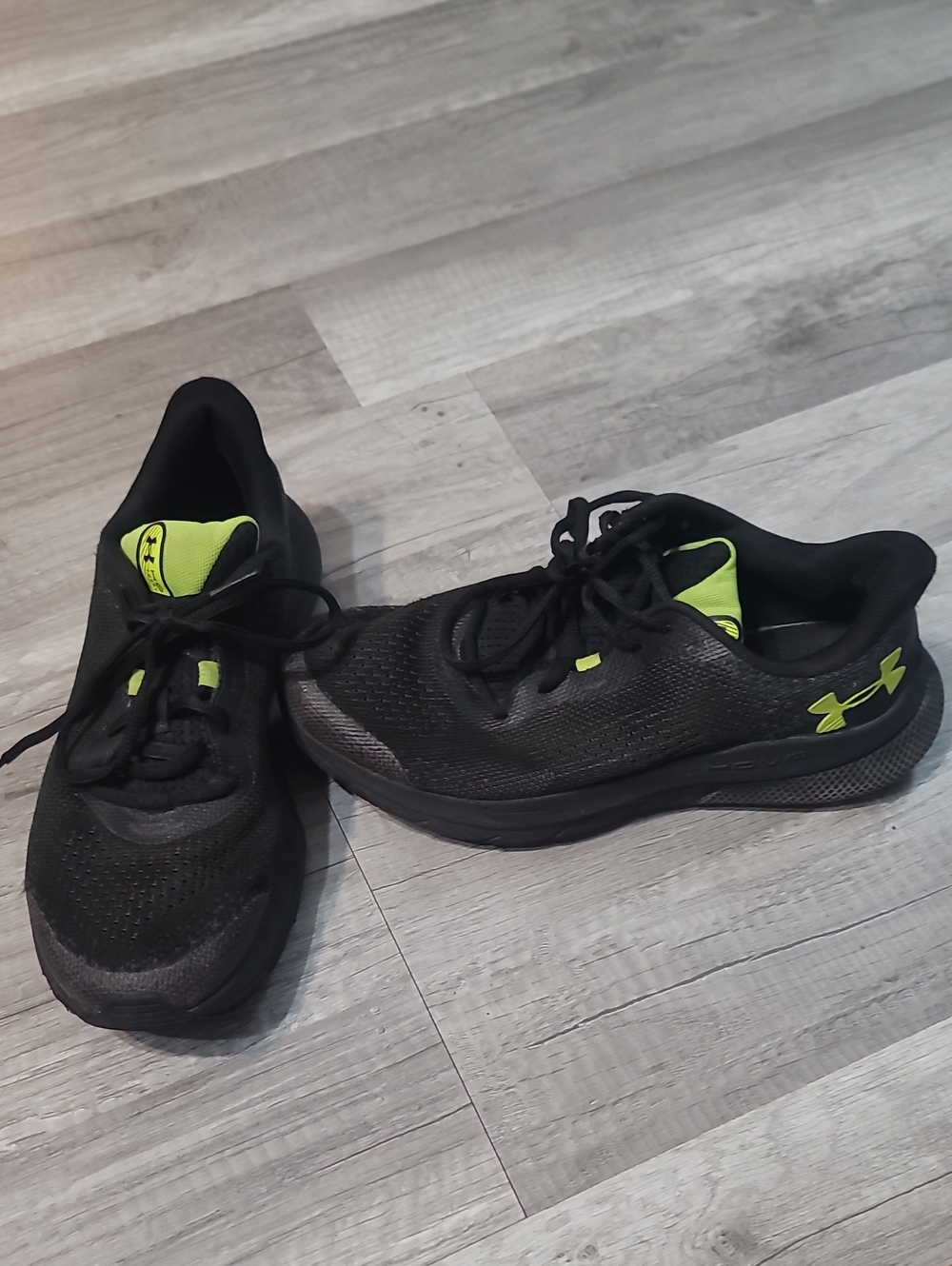 Under Armour Men’s Black Running Shoes with Neon Green Accents
